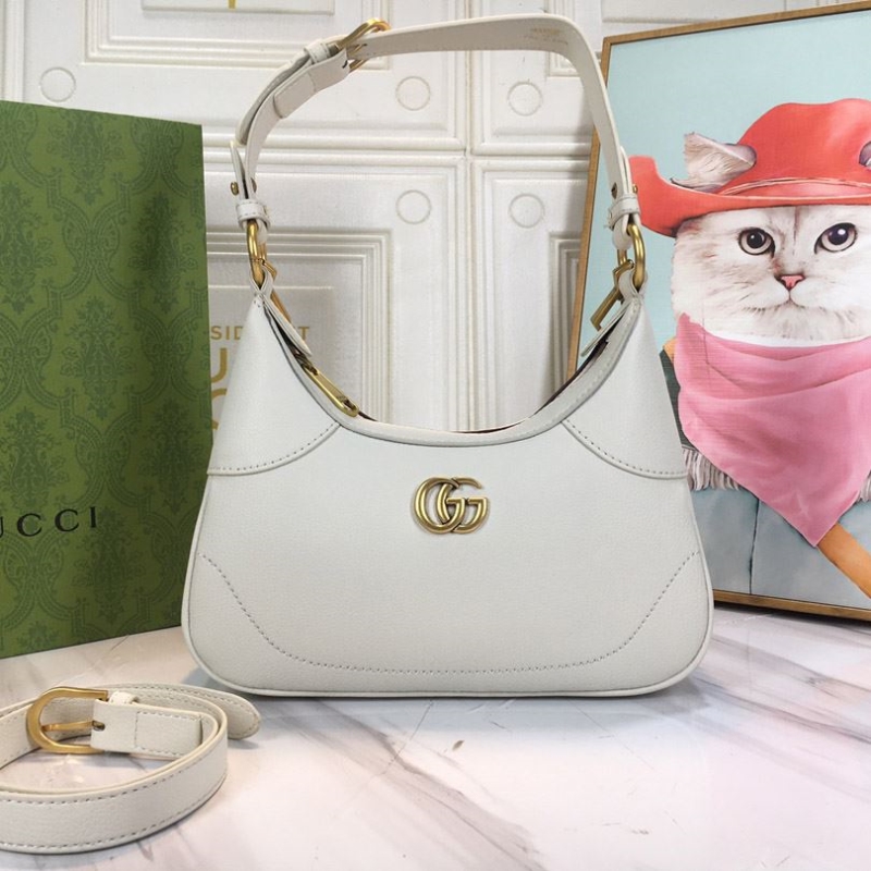 G*u*i top handle bags